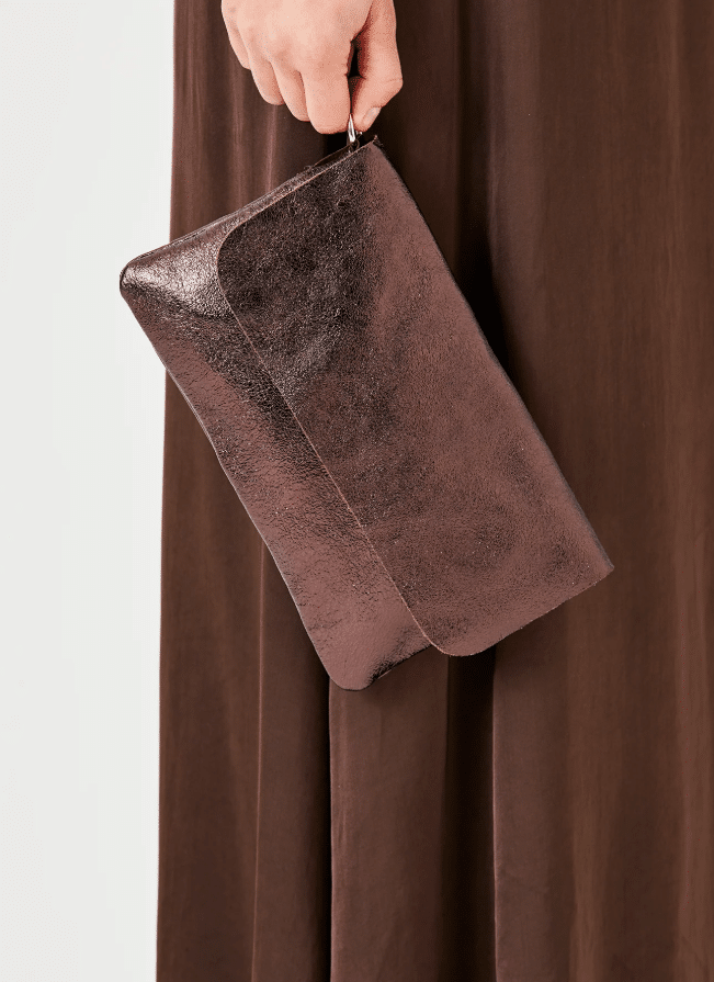 Suzy D Milano Shimmer Leather clutch bag With Fold Over Styling In Rust